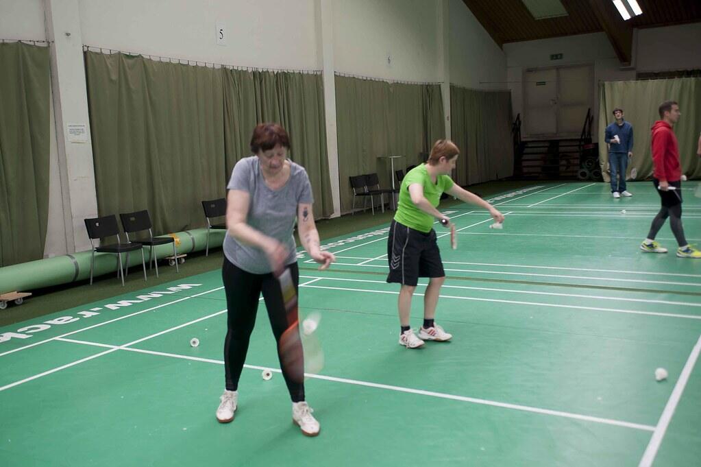 Indoor badminton hall with marked courts