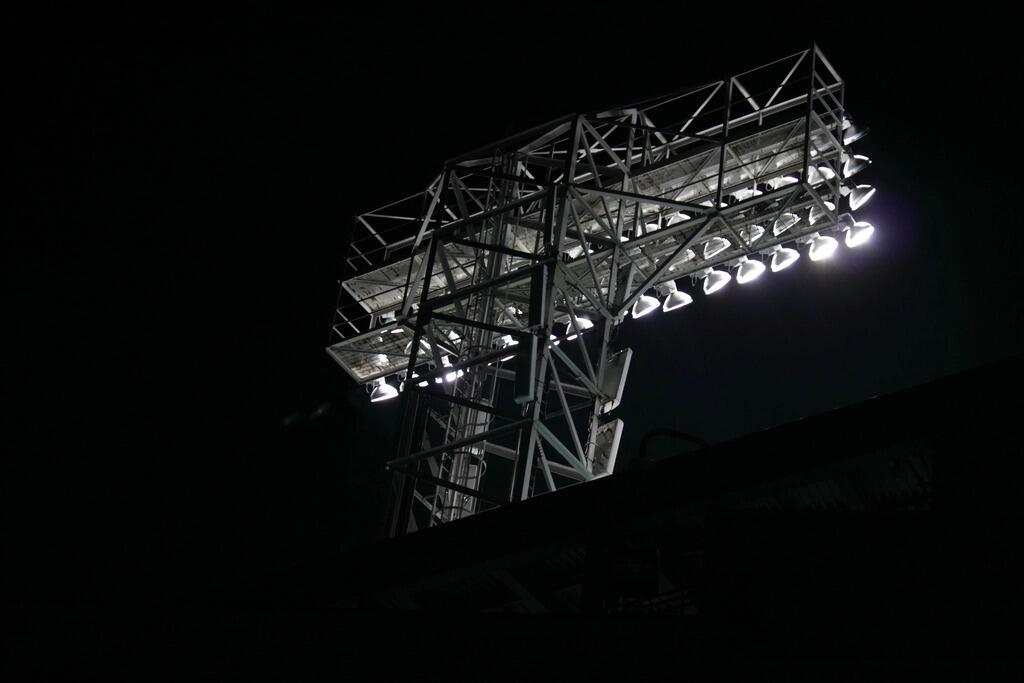LED floodlight tower over a sports ground